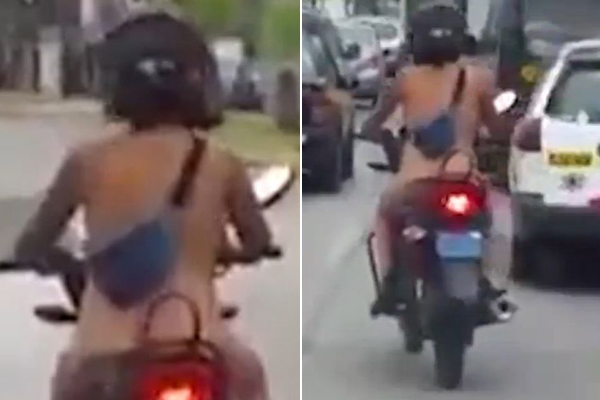 Người phụ nữ thản nhiên khỏa thân lái xe máy